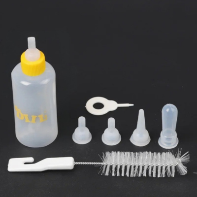 biberon chaton jaune avec petit kit