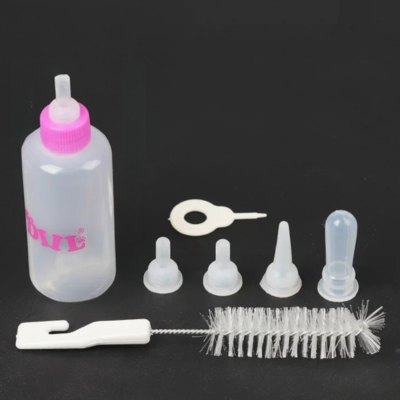 biberon chaton rose avec petit kit