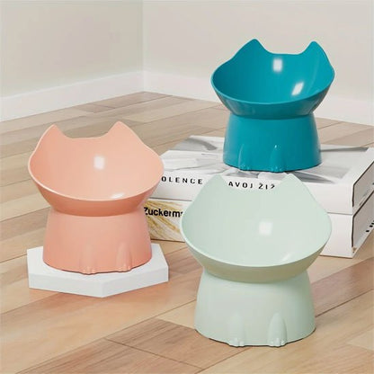 Gamelle Chat surélevée qui est en plusieurs couleurs sur table